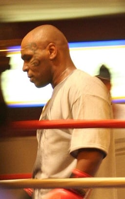 What is Mike Tyson known for in the sports world?