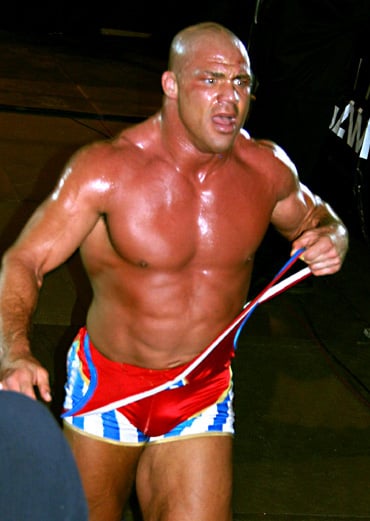 Which wrestling legend described Kurt Angle as "the most gifted all-around performer we have ever had step into a ring"?
