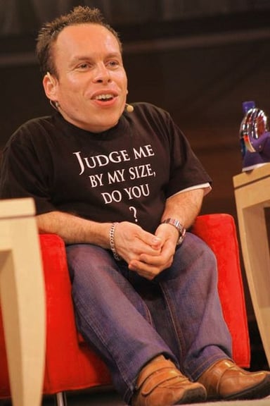 What is Warwick Davis's role in the Star Wars series?