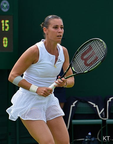 Which team competition did Flavia Pennetta compete in for Italy?