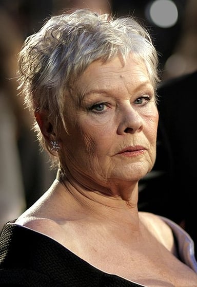 In which James Bond film did Judi Dench first appear as M?