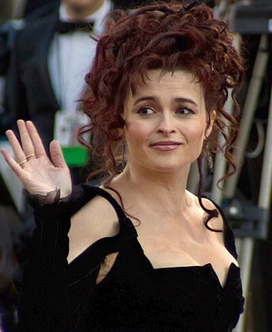 Which International Emmy Award did Helena Bonham Carter win for her role as Enid Blyton in the biographical film "Enid"?