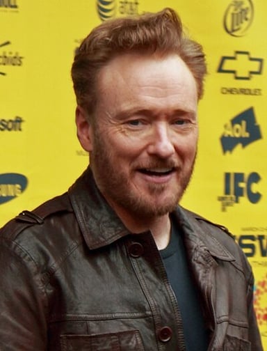 In which year was Conan named one of Time's 100 Most Influential People?