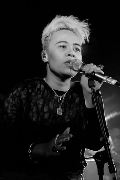 Which song was Emeli Sandé's first top 10 single on the UK Singles Chart?