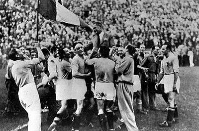 In which year did Italy win the Olympic football tournament?