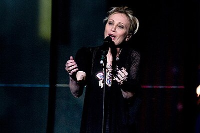 What musical genres does Patricia Kaas primarily sing?