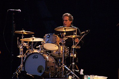 What band is Max Weinberg famously known for drumming with?