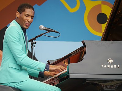 In what year did Jon Batiste serve as a music director on The Late Show with Stephen Colbert?