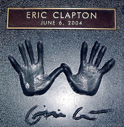 Select Eric Clapton's record labels:[br](Select 2 answers)