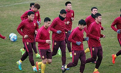 Which language is primarily used for the official name of the China national football team?