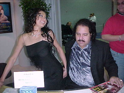 In which year was Ron Jeremy charged with multiple counts of rape and sexual assault?