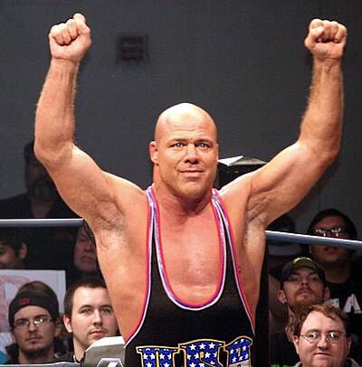 Which Japanese wrestling promotion did Kurt Angle win the IWGP Heavyweight Championship?