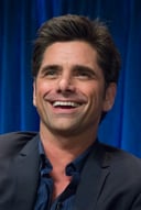 The John Stamos Trivia Challenge: Testing Your Knowledge on the Charismatic Actor and Musician!