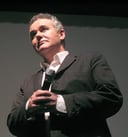 Unveiling the Mind of Adam Curtis: An Engaging Quiz on the Legendary British Documentary Filmmaker