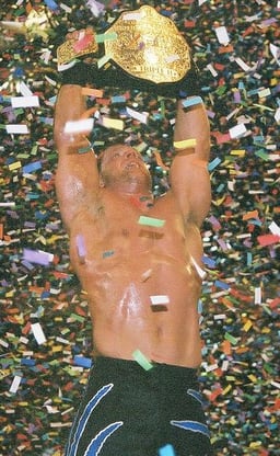 Which wrestling legend trained Chris Benoit?