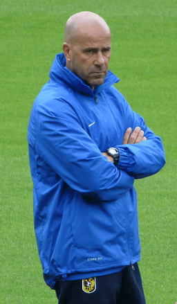 With which German club did Peter Bosz have a stint as manager?