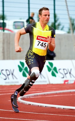 Which international athletics organization initially objected to Pistorius competing in nondisabled events?