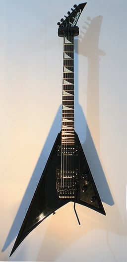 Who commissioned the Jackson Rhoads model guitar?