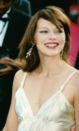 Who featured Milla Jovovich in Revlon's "Most Unforgettable Women in the World" advertisements?