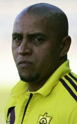 In which year did Roberto Carlos make his debut for the Brazil national team?