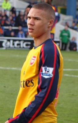 What was Kieran Gibbs' primary position before becoming a left-back?