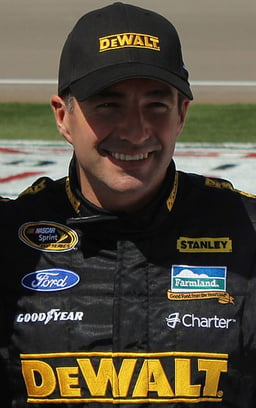 Which was the first NASCAR series that Marcos Ambrose participated in?