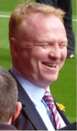 Which team did McLeish manage after being terminated by Aston Villa?