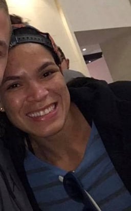 Which team did Amanda Nunes train with during her MMA career?