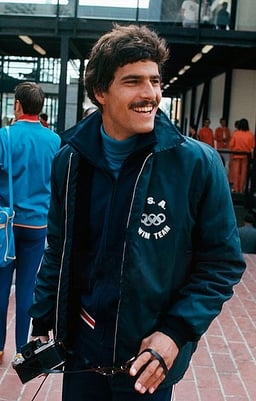 Mark Spitz was the third athlete to win how many Olympic gold medals?