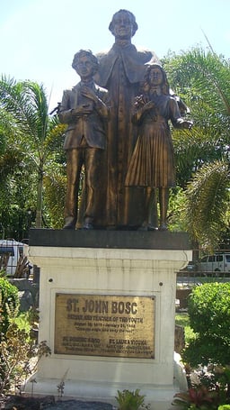 What kind of children did John Bosco dedicate his life to?