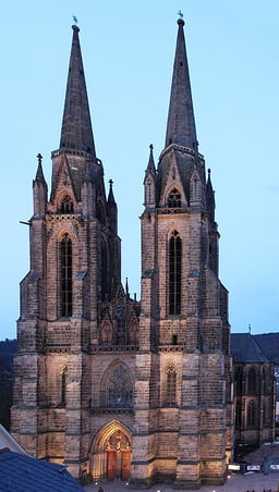 Which famous brothers studied law in Marburg?