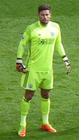 Which club did Ben Foster play for on loan before permanently joining Manchester United?