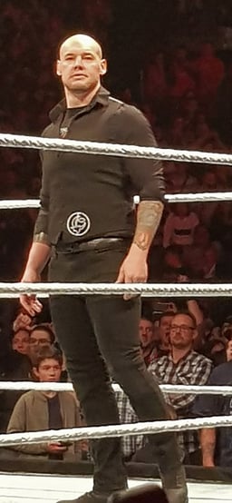 Who managed Baron Corbin in 2022?