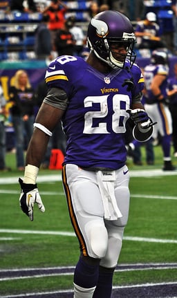 What is the age of Adrian Peterson?