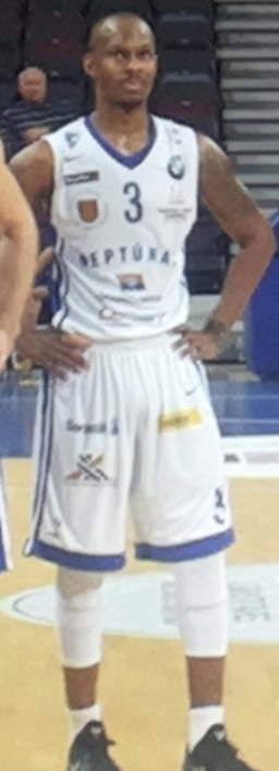 What is the color of BC Neptūnas' home jersey?