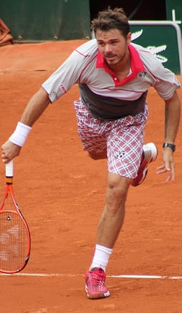 Which surface does Stan Wawrinka consider his best and favorite?