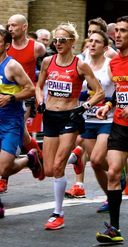 Which marathon did she run as her last competitive race?