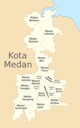 What is the official language spoken in Medan?