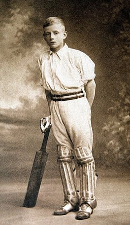 In which month did A. E. J. Collins achieve his record-breaking cricket score?
