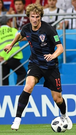 Which country does Tin Jedvaj represent?