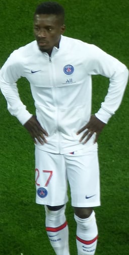 With which club did Gueye won a Ligue 1 and Coupe de France double?