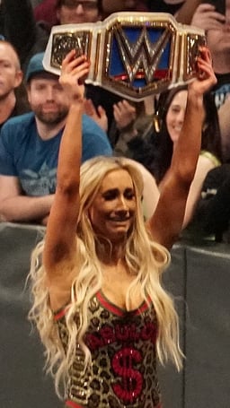 When did Carmella sign her WWE contract?