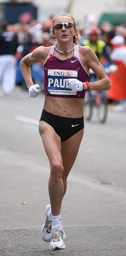 In what year did she run her fastest marathon?