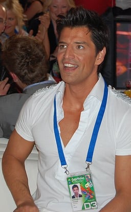What genres best describes Sakis Rouvas?[br](select 2 answers)