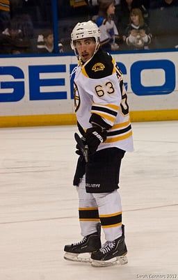 In the 2021–22 NHL season, how many games was Brad Marchand suspended?