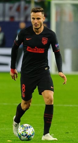 Which Spanish team level did Saúl Ñíguez first represent?