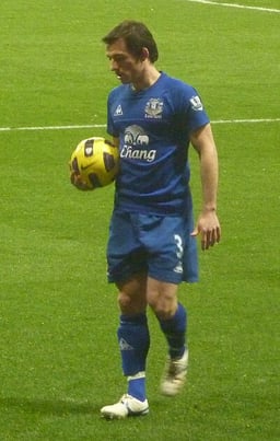 What dual role does Baines currently occupy at Everton FC?
