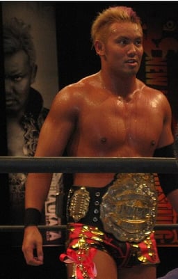 Who was Okada's sidekick during TNA?