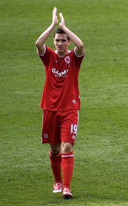 What team did Downing join after leaving Middlesbrough in 2009?