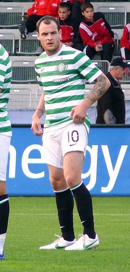 For which club did Anthony Stokes begin his senior career?